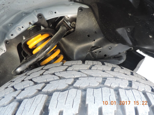 Toyota Hilux cash-in-transit vehicle tire and suspension detail