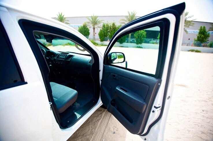 Toyota Hilux Troop Carrier armored vehicle passenger door open view