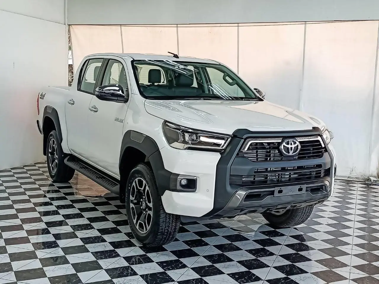 Toyota RHD Hilux 2.8L DC armored pickup front left angle