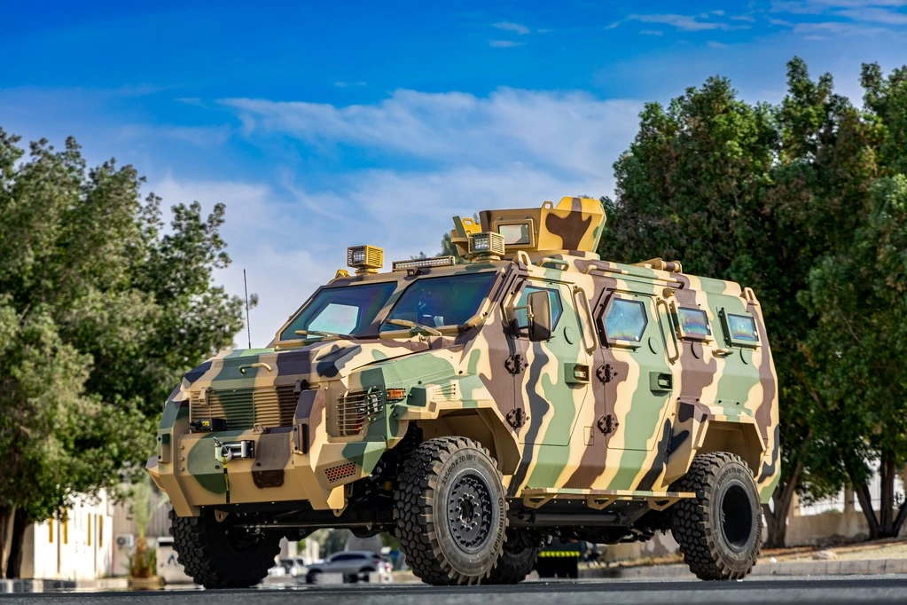 Ford F550 APC Camo front left angle view with armored bodywork