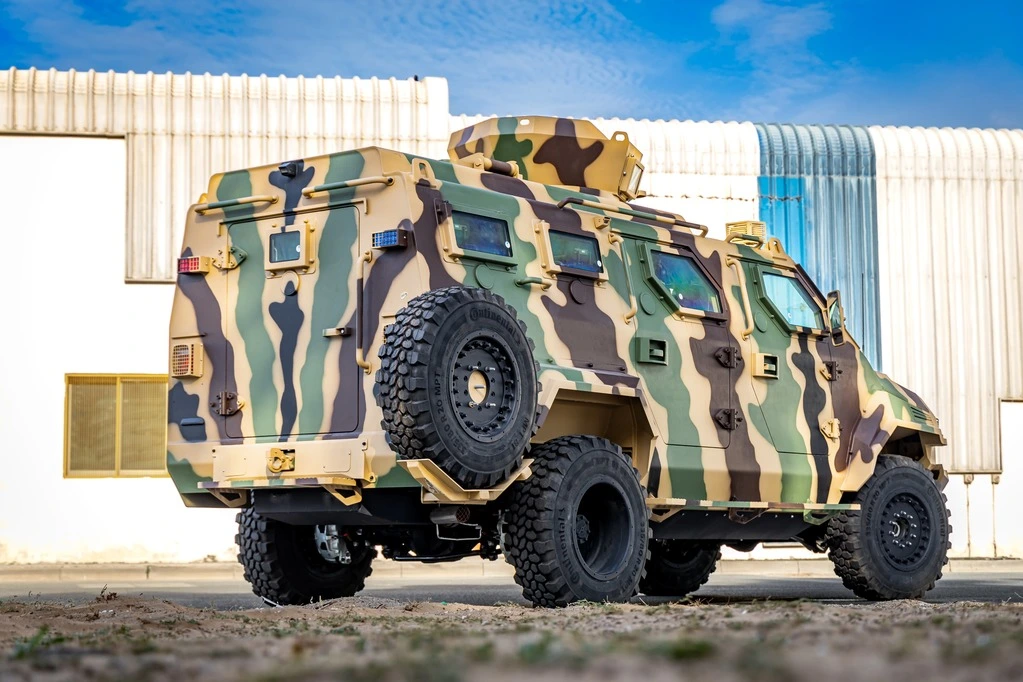 Ford F550 APC Camo rear view with fortified access points and camouflage finish