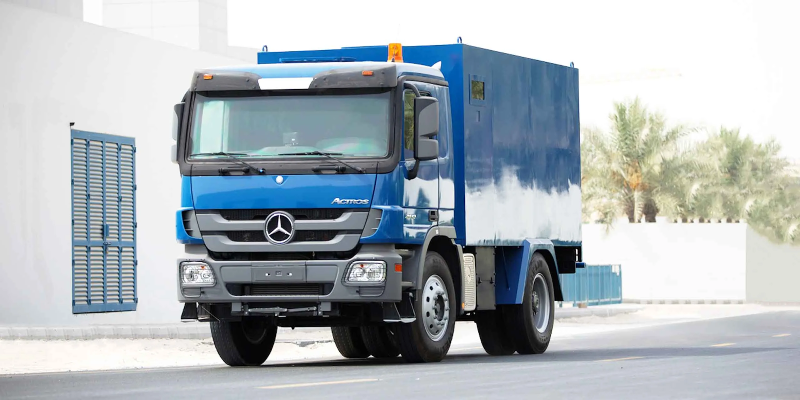 Armored Mercedes-Benz Actros cash-in-transit truck, complete exterior three-quarter view